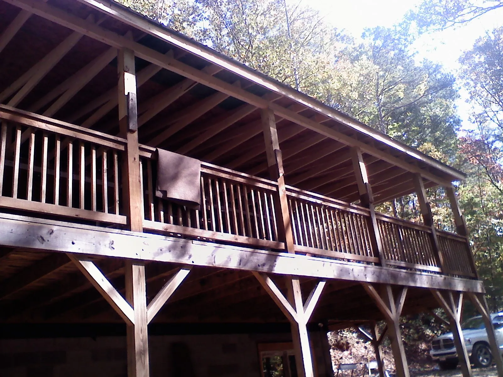 Timber framing under a new elevated porch and deck — Roof Leak Repair in Cullman by Roofing Brothers